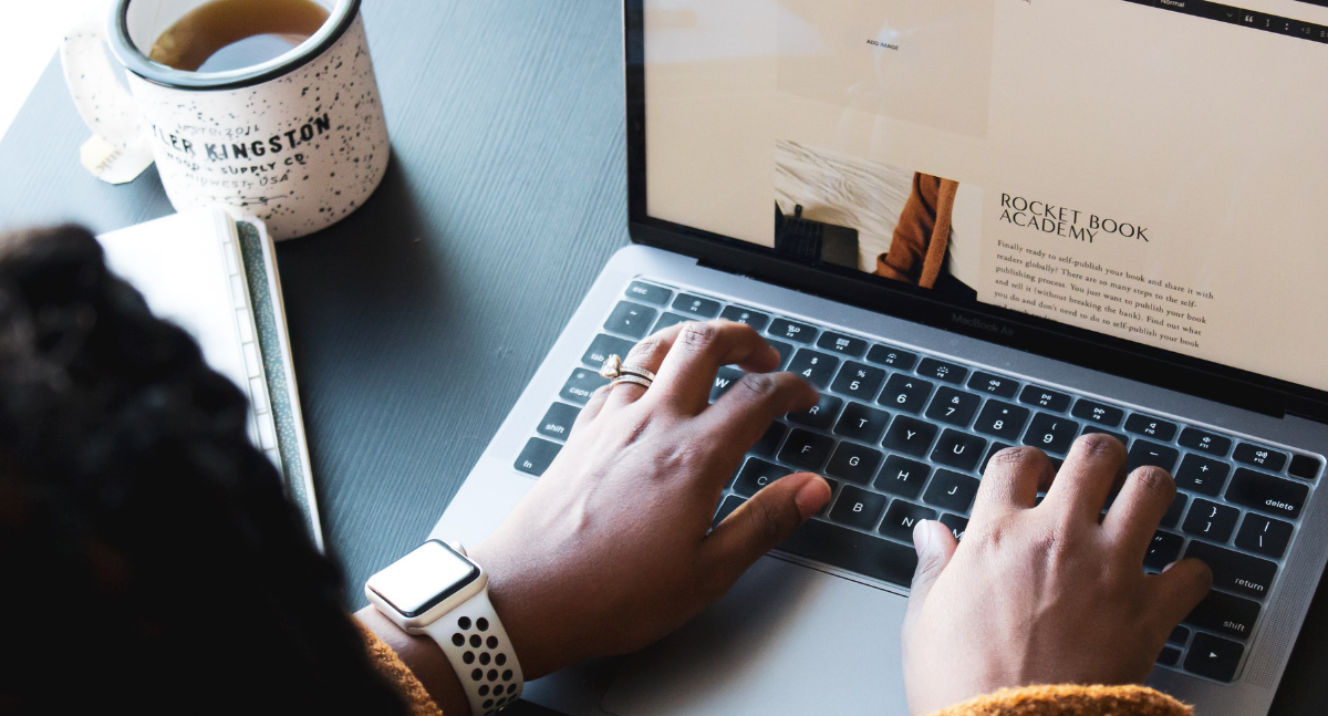 Cover photo illustrating some working on their laptop