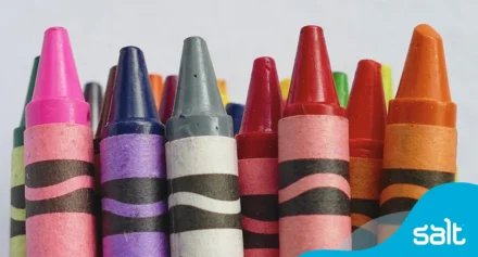 Different colour crayons representing diversity and inclusivity.