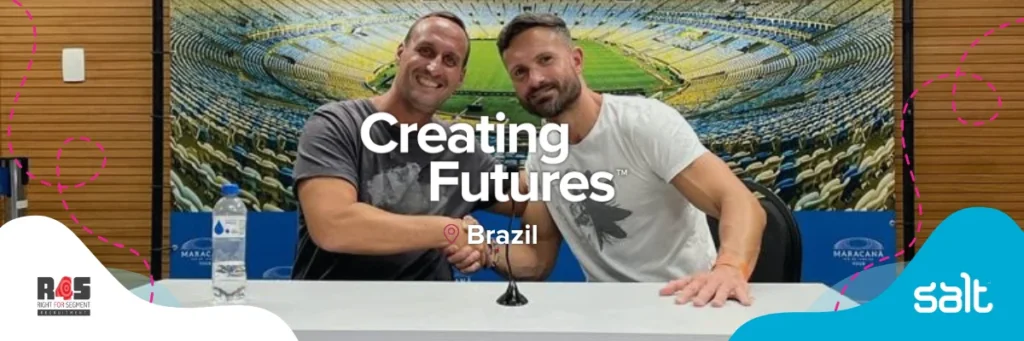 Criando impacto positivo na economia digital do Brasil 2 Elliot Dell and Rafael Vanselow shaking hands.