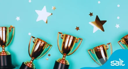 Tropies and shiny stars in celebration of award win.