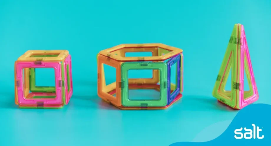 Reach, recognise, reward: why and how to handle employee compensation 1 Colourful and bright magnetic tiles stuck together building shapes.