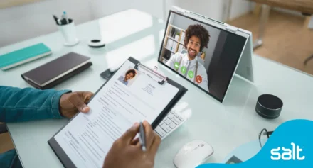 Virtual interview in progress, man on tablet being digitally interviewed