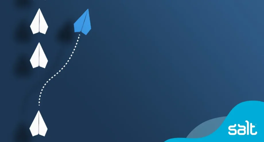 What makes a good leader in today's digital era 1 Blue paper plane breaking away from a group of white planes, symbolising innovative leadership in the digital era
