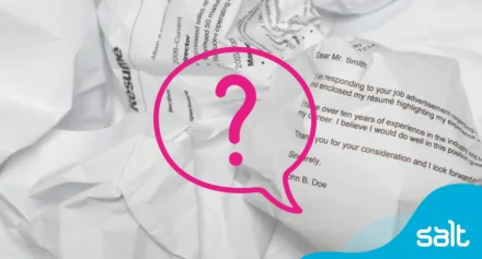 Cover letters crumpled up with a question mark