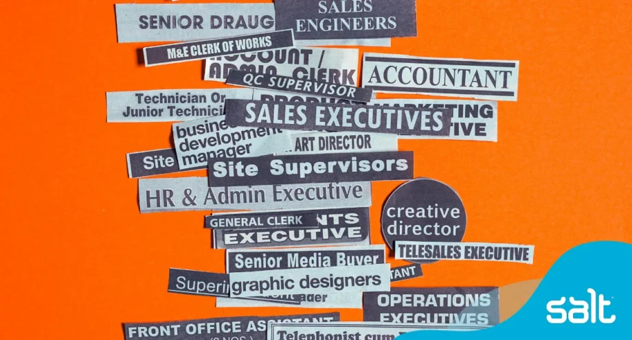 A list of job titles cut out of newspapers on an orange background