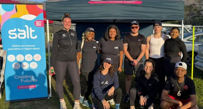 Salt team posing together outdoors at a sports community event