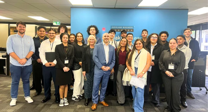A group of young professionals and mentors pose together at the Auckland Business Chamber, marking a collaborative learning and networking event