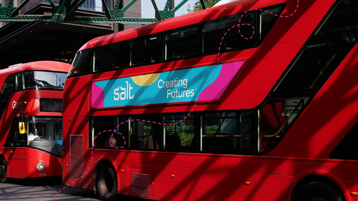 London red double-decker bus with Salt Creating Futures banner for Salt recruitment London