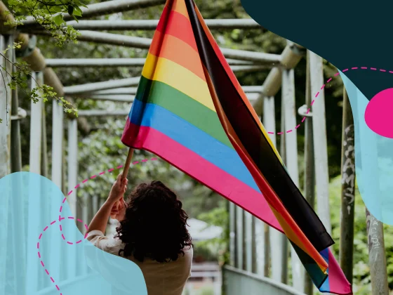 Woman waving a pride flag