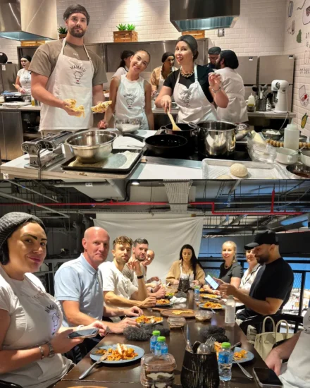 Salt team members participating in a cooking class - first preparing food in a kitchen, then enjoying their meal together at a long dining table.