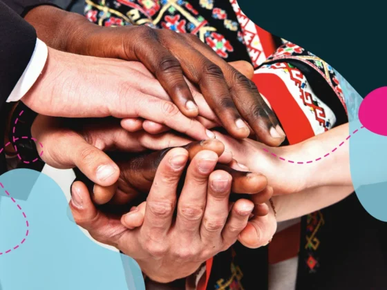 Diverse hands holding each other representing togetherness of South Africans.