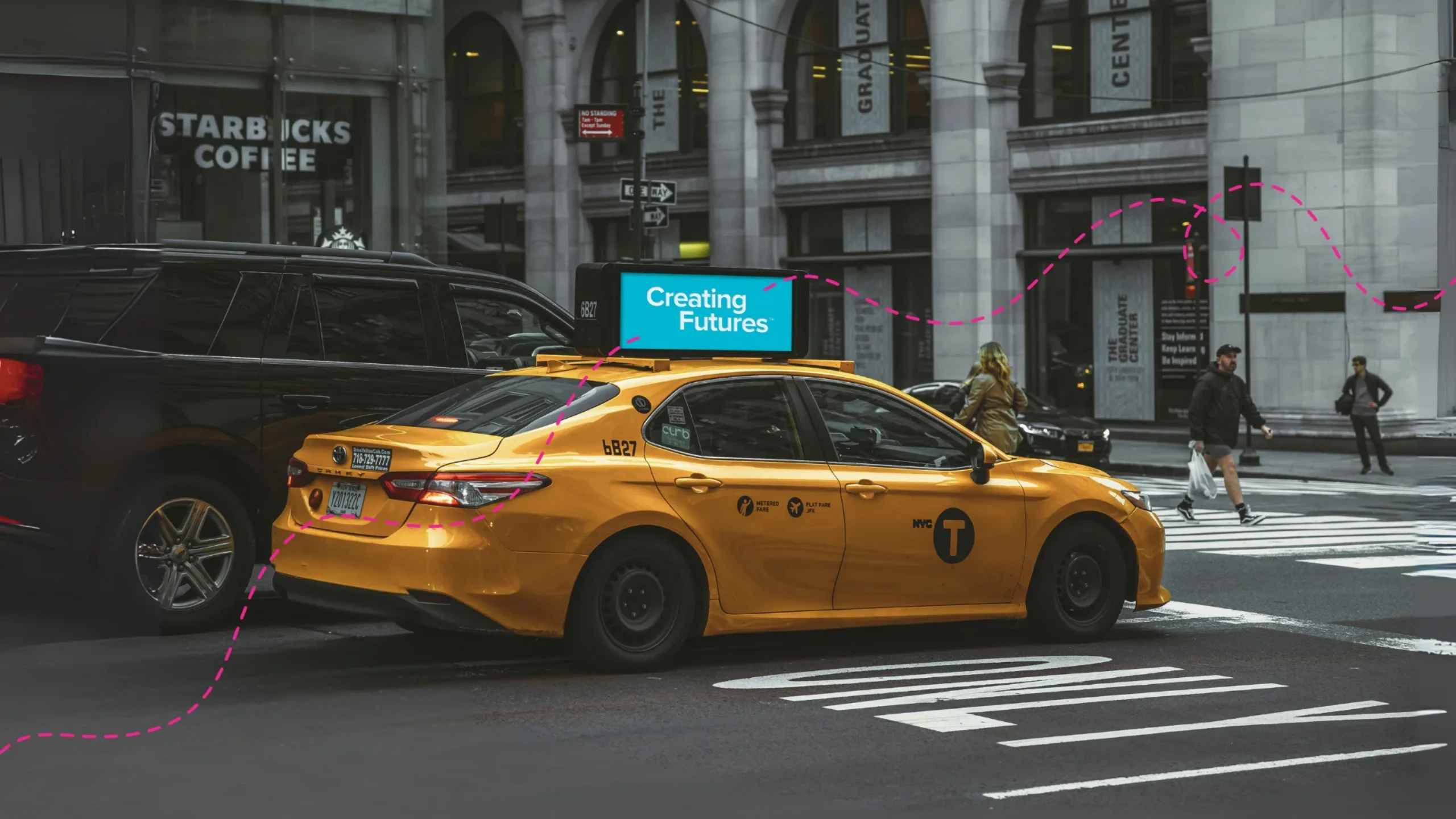 New York taxi with "Creating Futures" written on the medallion light.