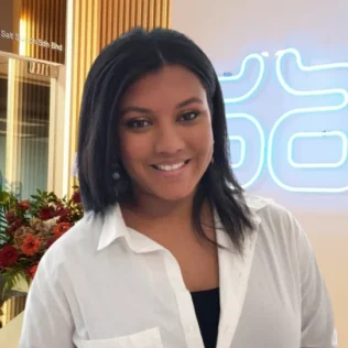 Billie-Jean Demas headshot in a Salt office