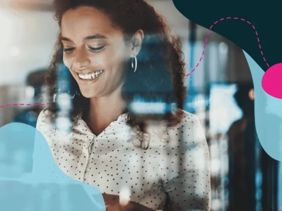 Women looking at a screen smiling