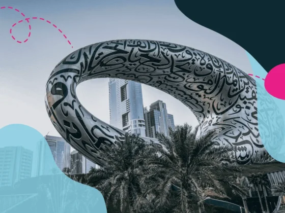 Futuristic building in Dubai with Arabic calligraphy design.