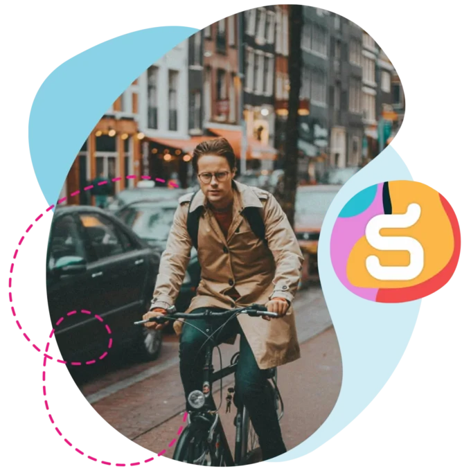 Man riding on a bike in Amsterdam.