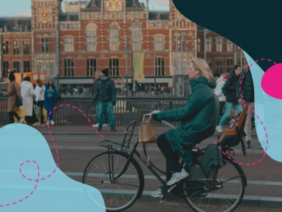 Woman traveling in Amsterdam on a bicycle.