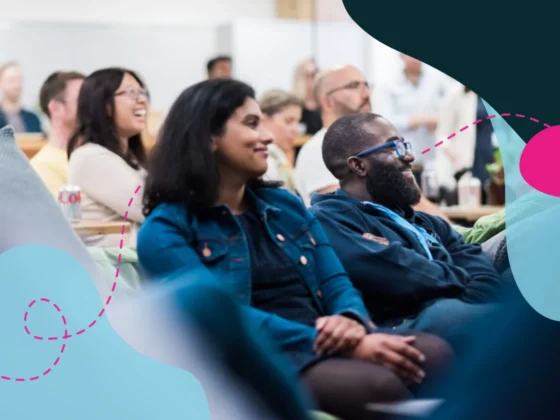 People sitting in a conference.