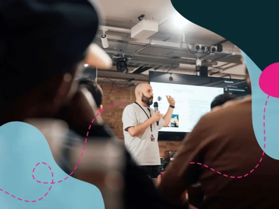 Man speaking in a room of people