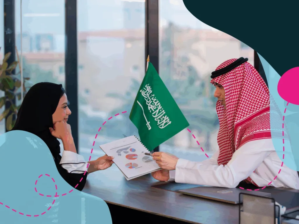 Fintech trends shaping Saudi Arabia and the Middle East 2 People working together in Saudi office