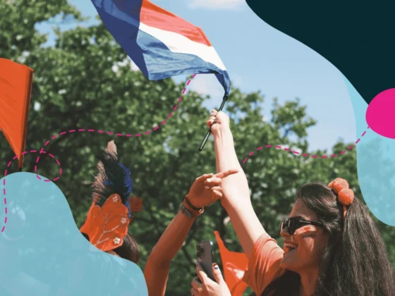 People waving The Netherlands flag.