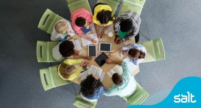 Group or team sat around a round table