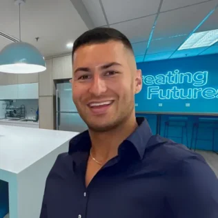 Andrew Saltos headshot in a Salt office.